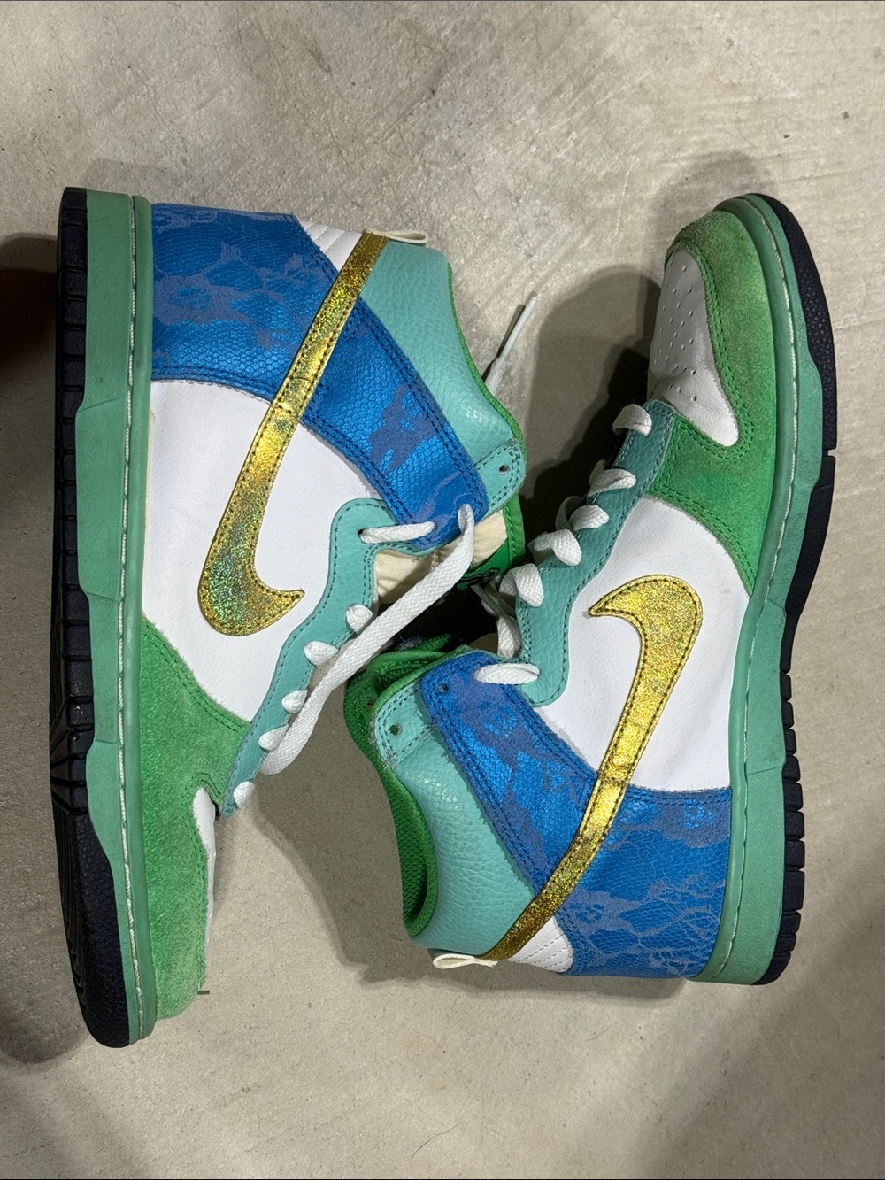 Nike Dunk High 6.0 sneakers in a green, white, blue, and metallic gold colorway